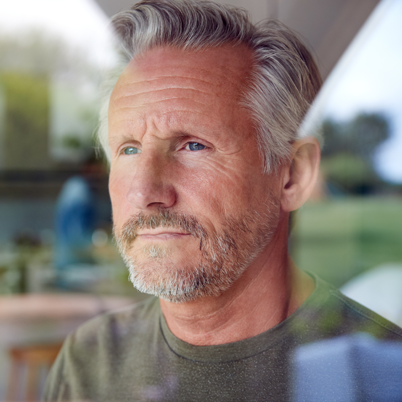 portrait of older person looking past camera